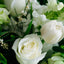 A timeless bouquet of fresh white blooms and natural greens