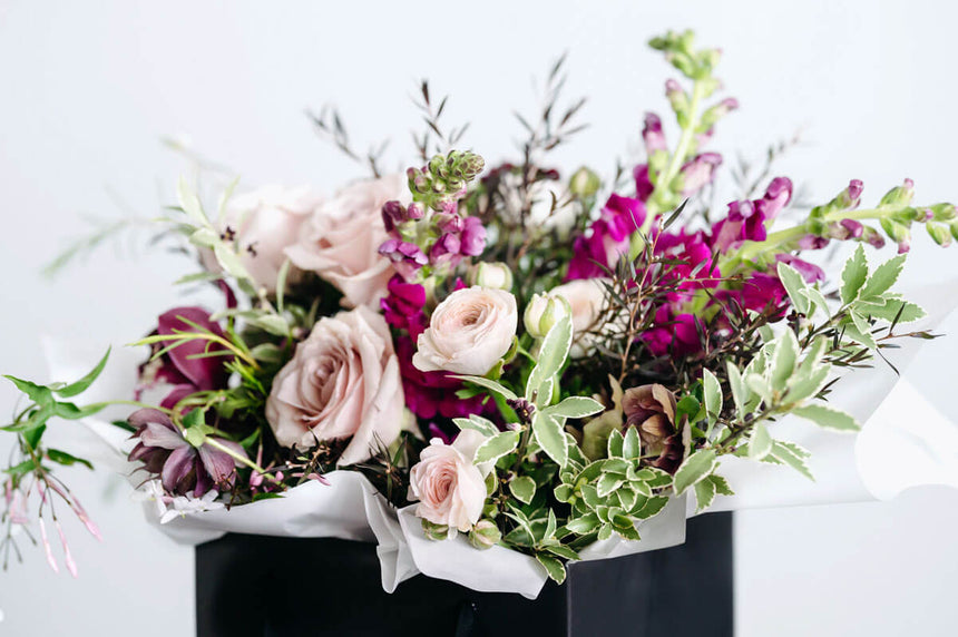 A bouquet of deep wine tones with pops of neutrals